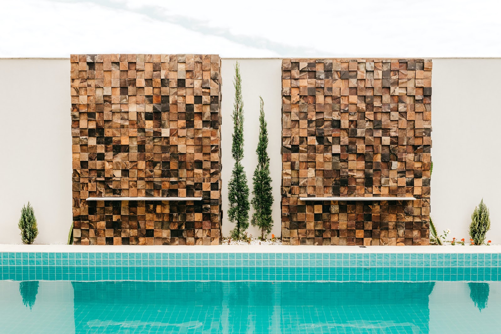 A pool at a house's backyard