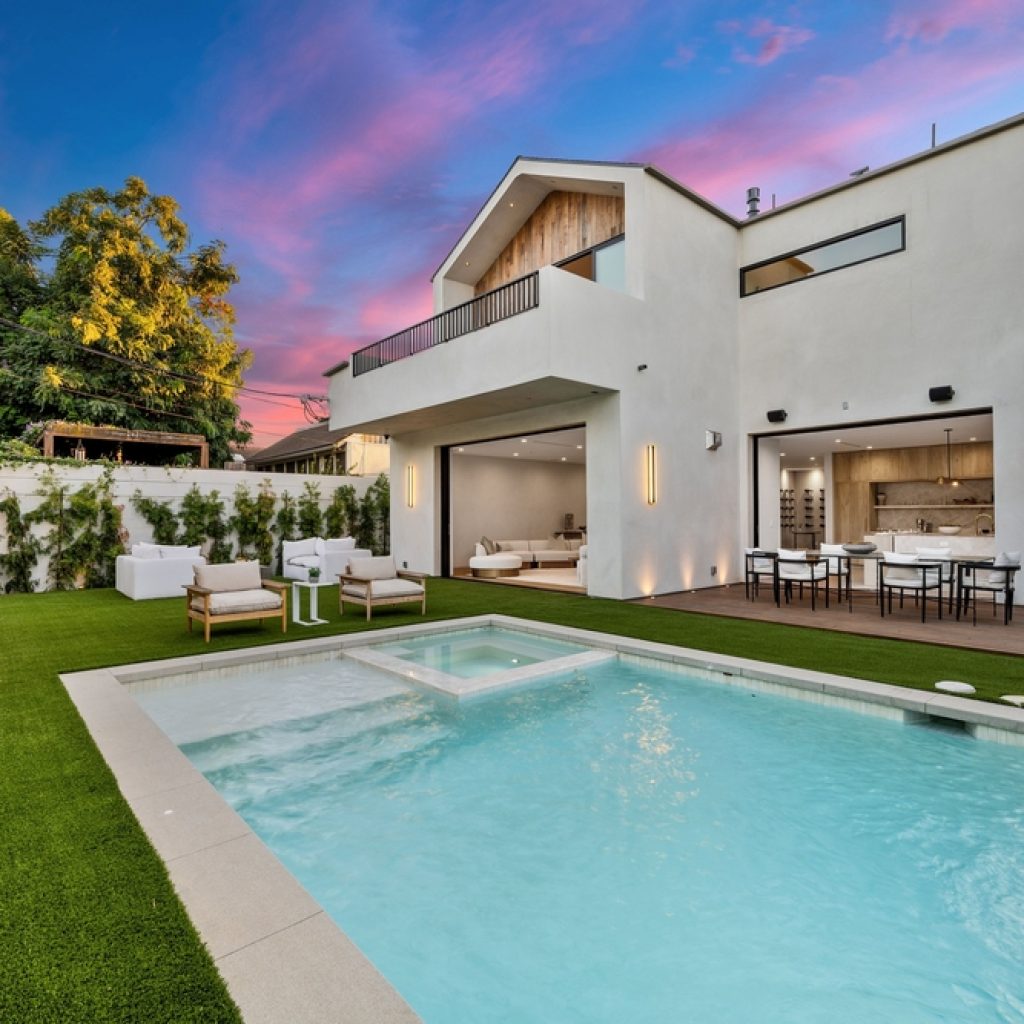 A luxurious backyard swimming pool.